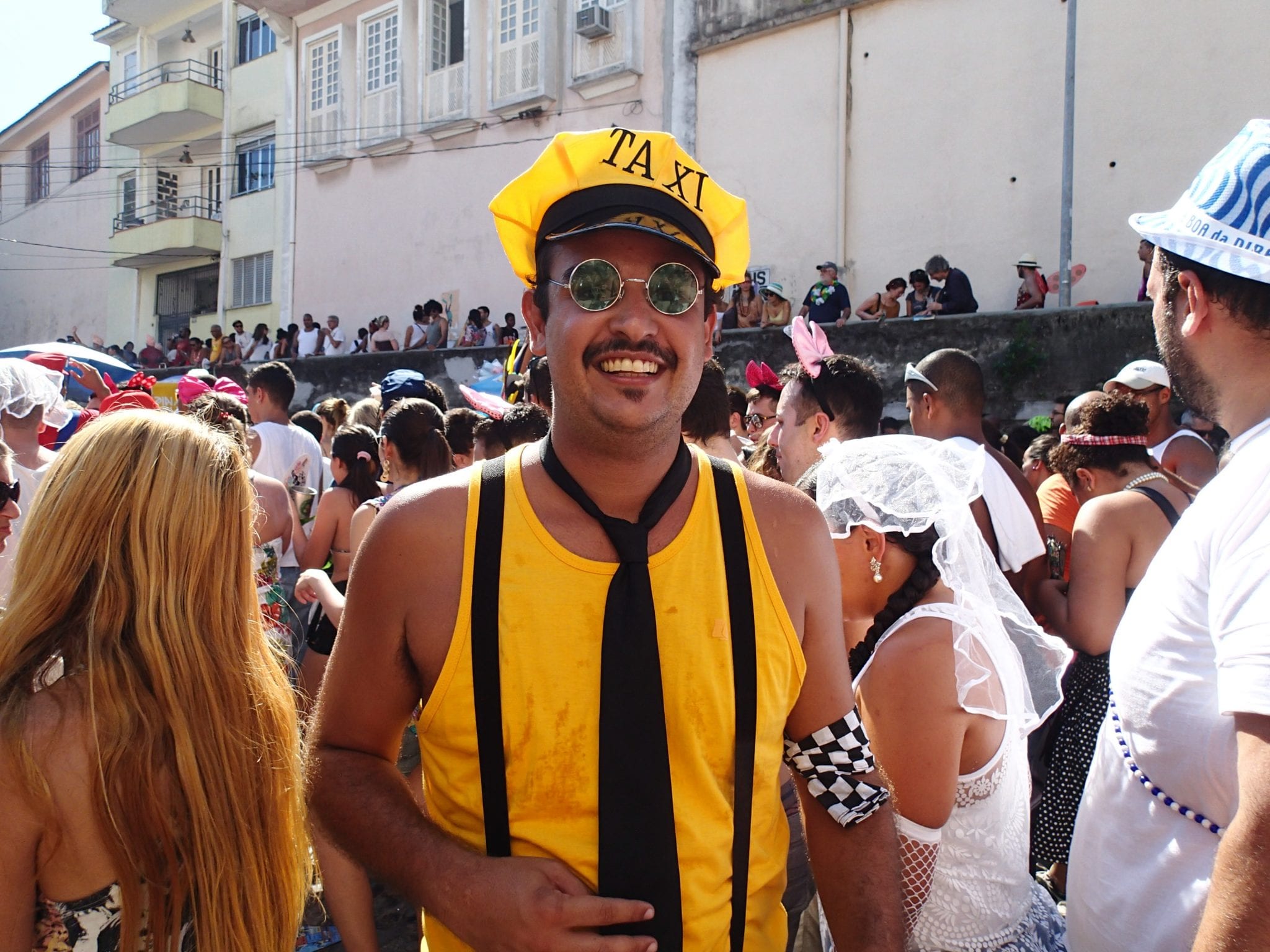 rio carnival tourism a man dressed as a taxi driver at rio carnival