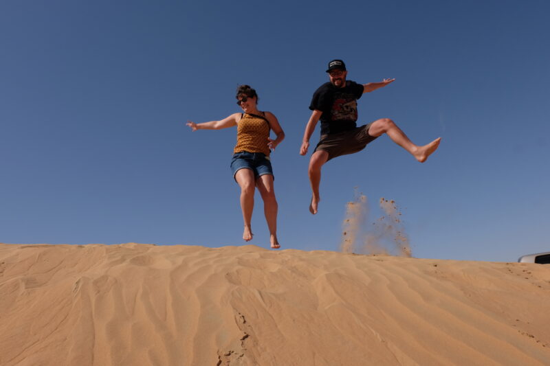 jumping in the dubai desert dunes