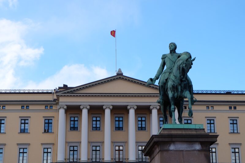 royal palace and statue in oslo
