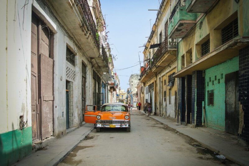 a classic car on the streets of old town havana, cuba