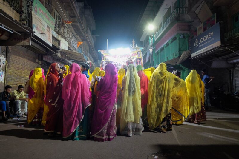 women parading through the streets of jodhpur