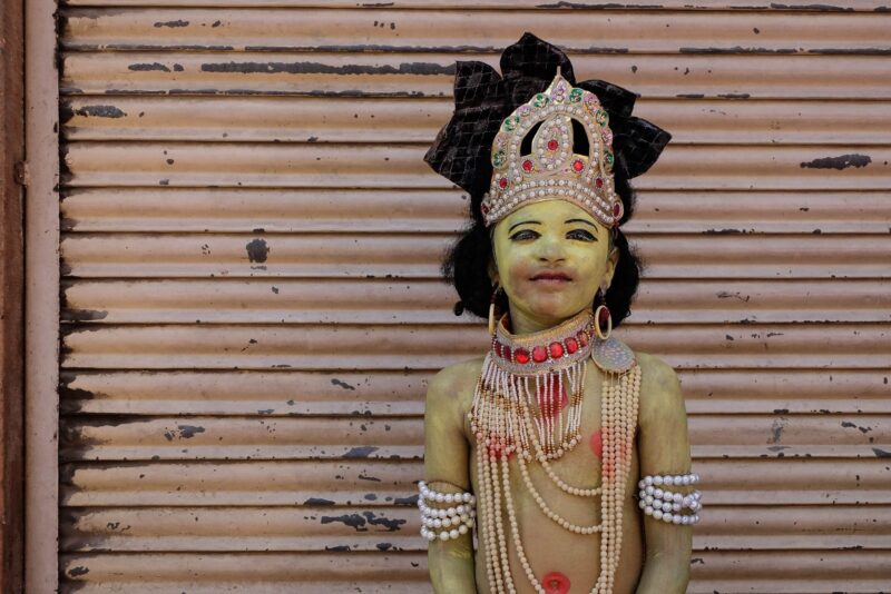 a little boy painted for mahaveer janma kalyanak festival in jodhpur, India