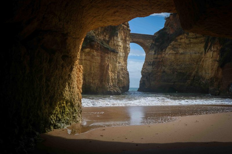 The view of the roman bridge of Praia dos Estudantes in Lagos, Portugal