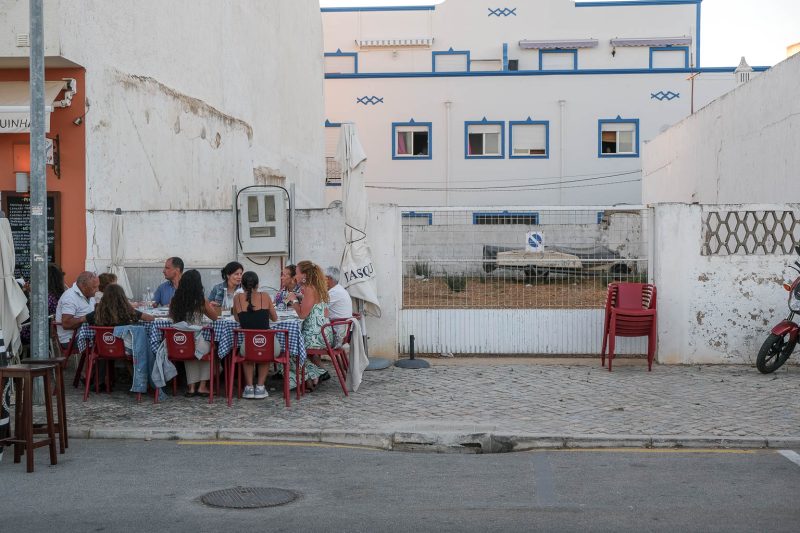 People dining on the Street in Santa Luzia, Algarve