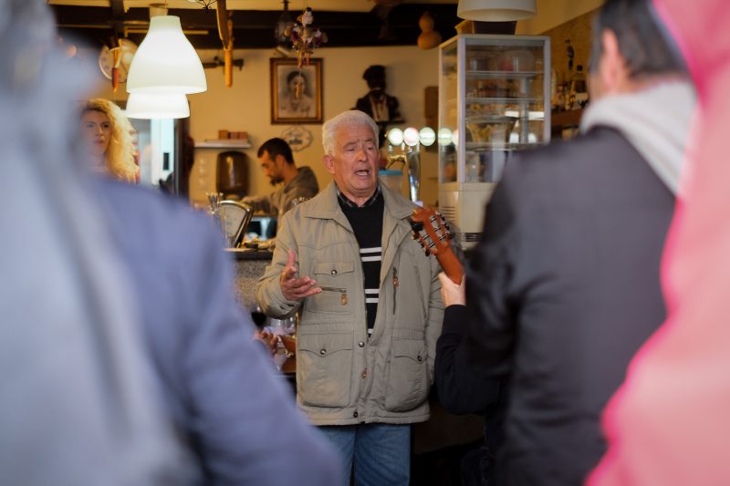 A Singer performing fado at Adega Rio Douro in Porto